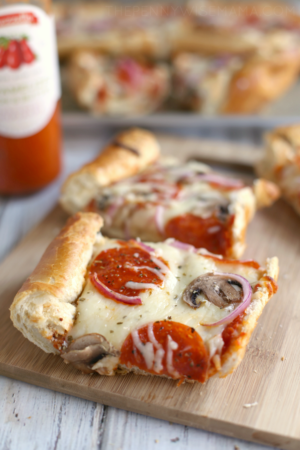 The BEST French Bread Pizza! Takes less than 30 mins to prepare. Click for the full recipe.