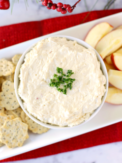 This Apple Cinnamon Cheddar Cheese Dip is a fun and unique twist on your classic cheddar cheese dip. Simple to make and full of flavor, it’s perfect for holiday parties or get-togethers. Serve with your favorite crackers, pretzels, or apple slices and watch it disappear!