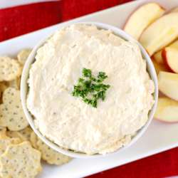 This Apple Cinnamon Cheddar Cheese Dip is a fun and unique twist on your classic cheddar cheese dip. Simple to make and full of flavor, it’s perfect for holiday parties or get-togethers. Serve with your favorite crackers, pretzels, or apple slices and watch it disappear!